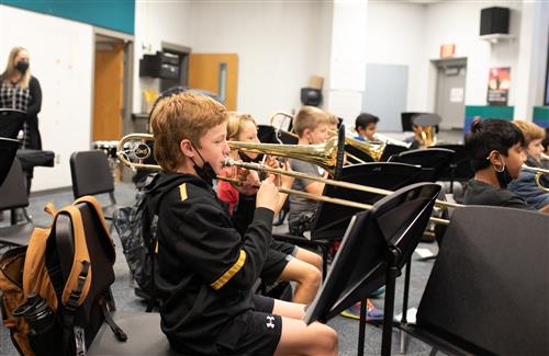 Prairie Star Middle School student playing the trumpet
